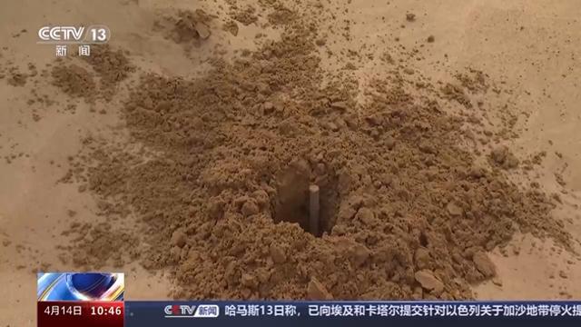 FB体育 FB体育平台风沙肆虐难钻孔 他们在沙漠植树治沙靠啥“黑科技”？(图1)